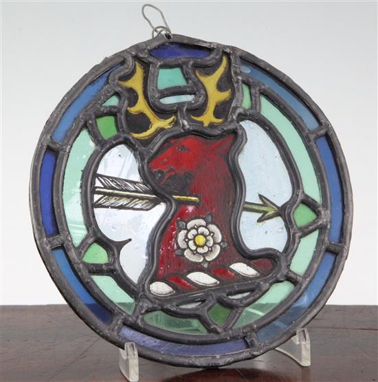 A Georgian stained glass armorial roundel, 7in.